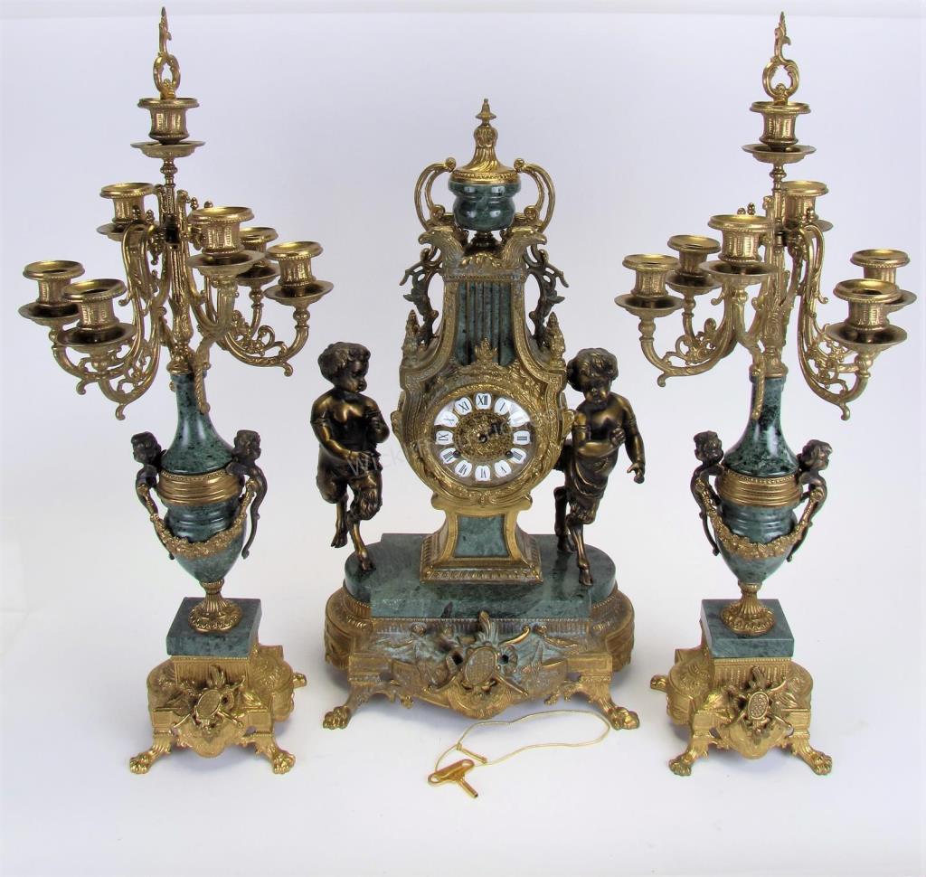 Appraisal: French Style Cast Metal Figural Shelf Clock with cherubs urn