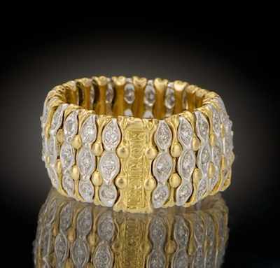 Appraisal: A Ladies' Flexible k Gold and Diamond Band Signed Moonlight