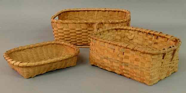 Appraisal: Group of three woven wood baskets largest h x l