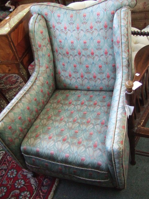 Appraisal: A late th century mahogany framed armchair with concave crest