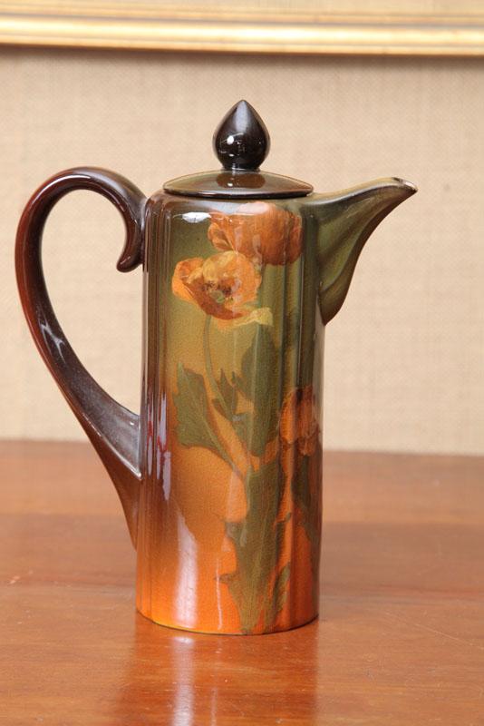 Appraisal: ROOKWOOD CHOCOLATE POT Decorated with orange and yellow Poppies and