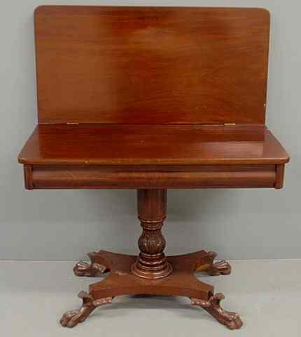 Appraisal: Empire mahogany flip-top card table c with a rectangular above