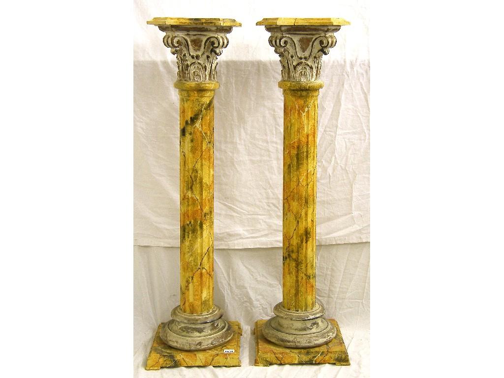 Appraisal: Pair of decorative painted faux marble Corinthian column pedestal stands