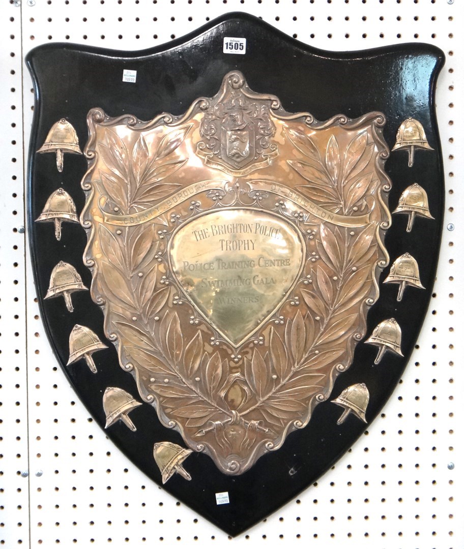 Appraisal: A silver mounted trophy shield Sheffield by Joseph Round surmounted