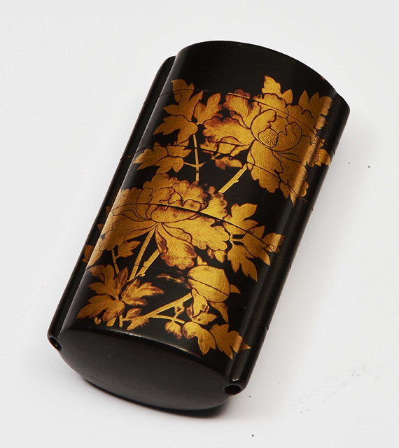 Appraisal: A JAPANESE LACQUER FOUR DIVISIONAL INRO with gilt decorated floral