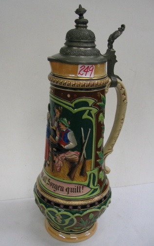 Appraisal: A GERMAN GLAZED POTTERY MASTER BEER STEIN with tavern scene