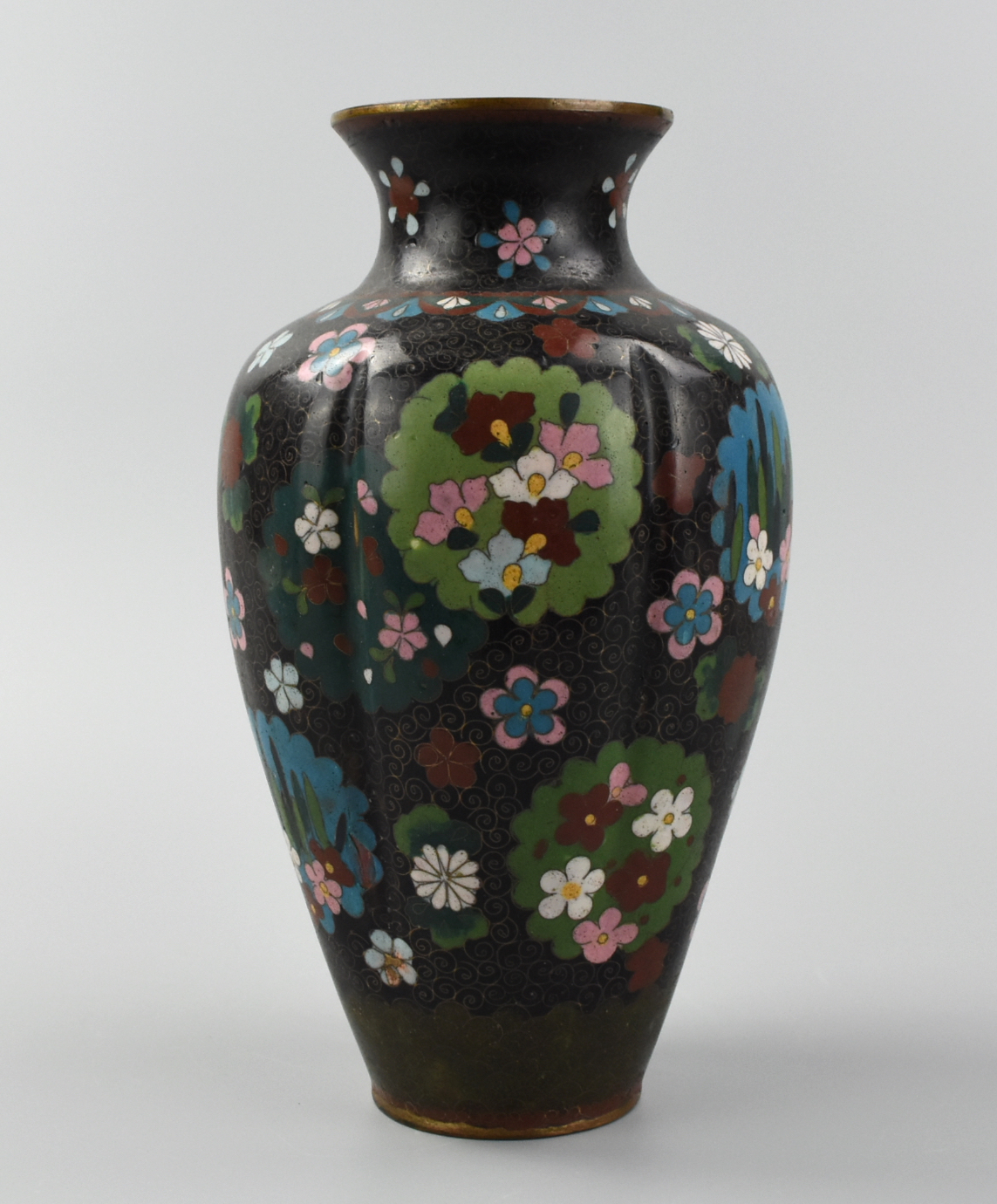 Appraisal: JAPANESE FLUTED FLORAL CLOSIONNE VASE TH C A Japanese cloisonne