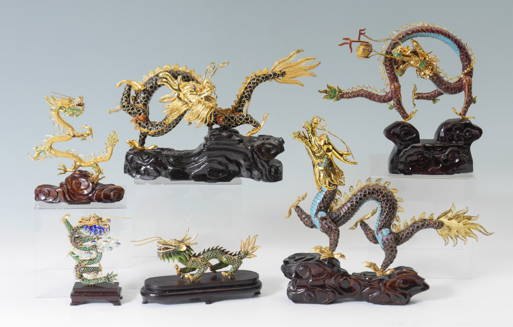 Appraisal: CHINESE ENAMELED GILT SILVER DRAGONS An assembled collection of gilt