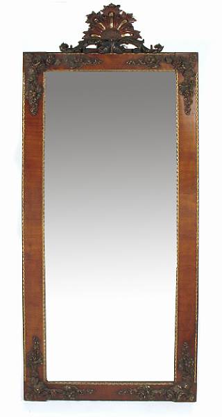 Appraisal: A Continental parcel gilt and walnut mirror height ft in