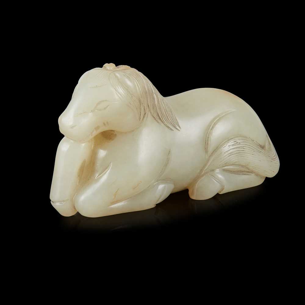 Appraisal: CELADON JADE CARVING OF A RECLINING HORSE MING DYNASTY OR