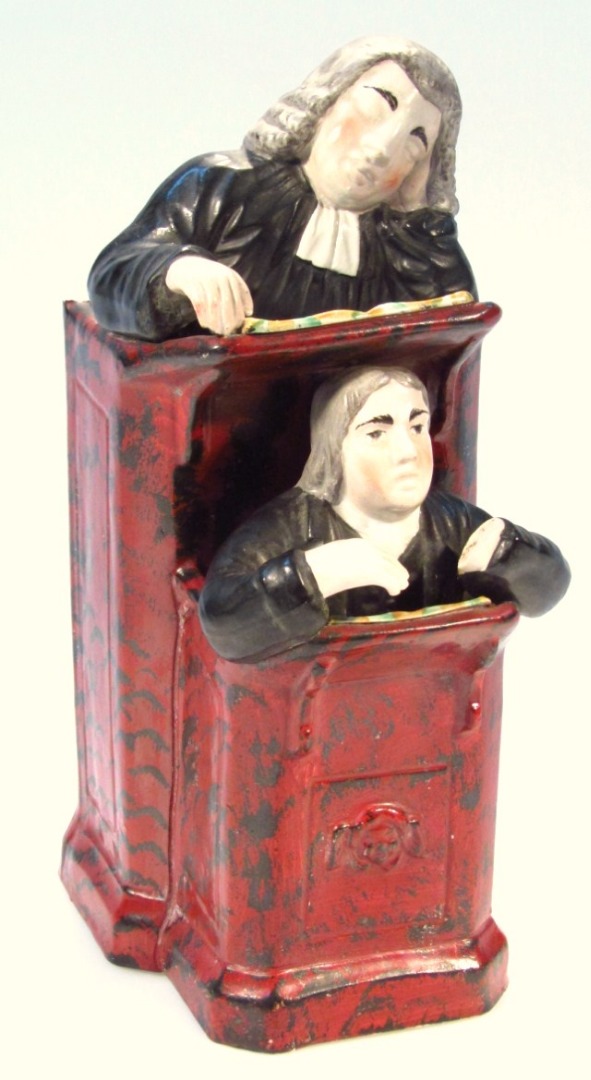 Appraisal: A thC Staffordshire pottery Vicar and Moses group enamel decorated