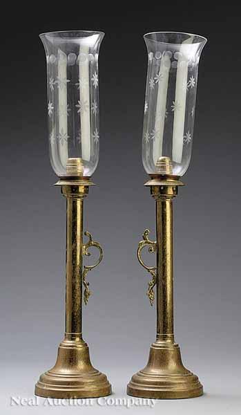 Appraisal: A Pair of English Brass Hurricane Candlesticks mid- th c