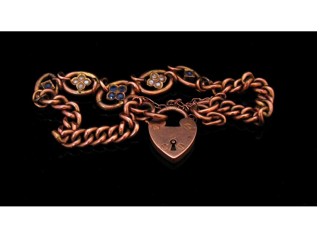 Appraisal: A CT ROSE GOLD CURB LINK BRACELET the five oval