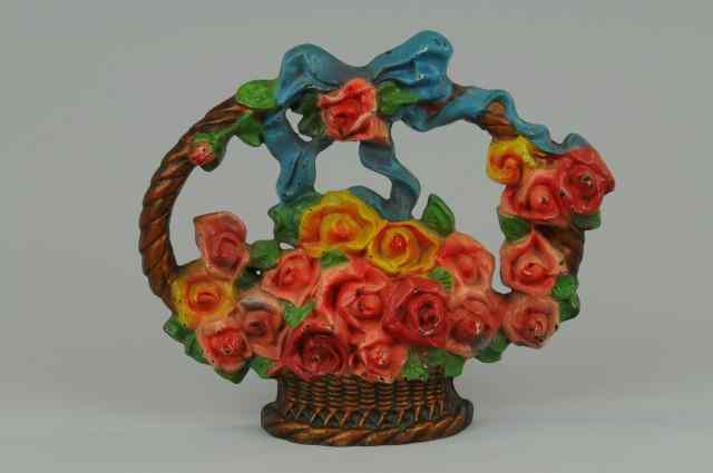 Appraisal: BASKET OF ROSES WITH BOW DOORSTOP ''LACS '' whimsical example