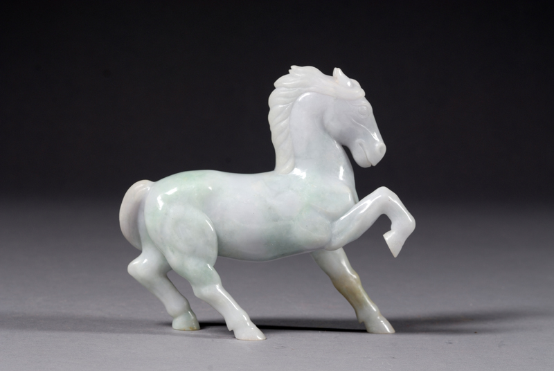 Appraisal: Jade Horse China early th century lavender-gray with apple green