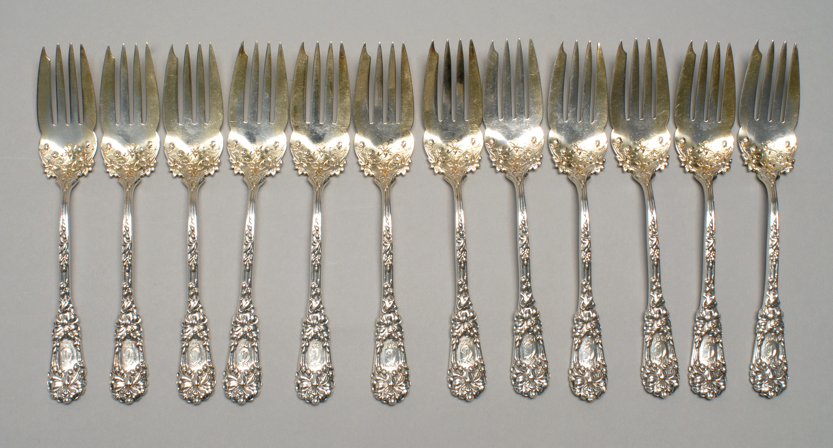 Appraisal: TWELVE STERLING SILVER DESSERT FORKS BY DURGIN DIV OF GORHAM