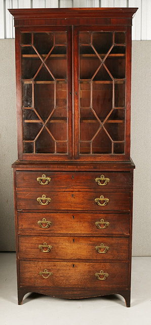 Appraisal: A GEORGE III MAHOGANY SECRETAIRE BOOKCASE of small proportions with