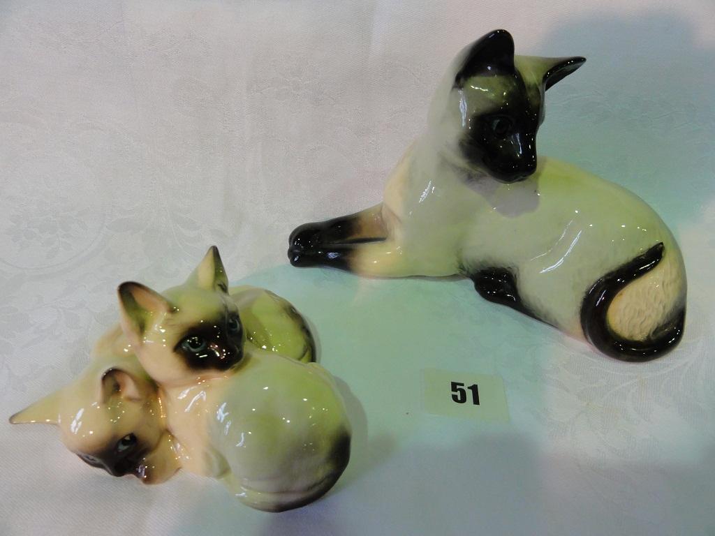 Appraisal: A Beswick model of a recumbent Siamese cat with impressed