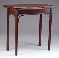 Appraisal: MAHOGANY CHIPPENDALE-STYLE CARD TABLE Shaped fold-over square top on a