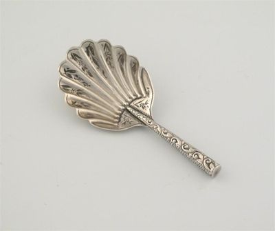 Appraisal: A late Victorian spoon with an engraved fluted bowl and