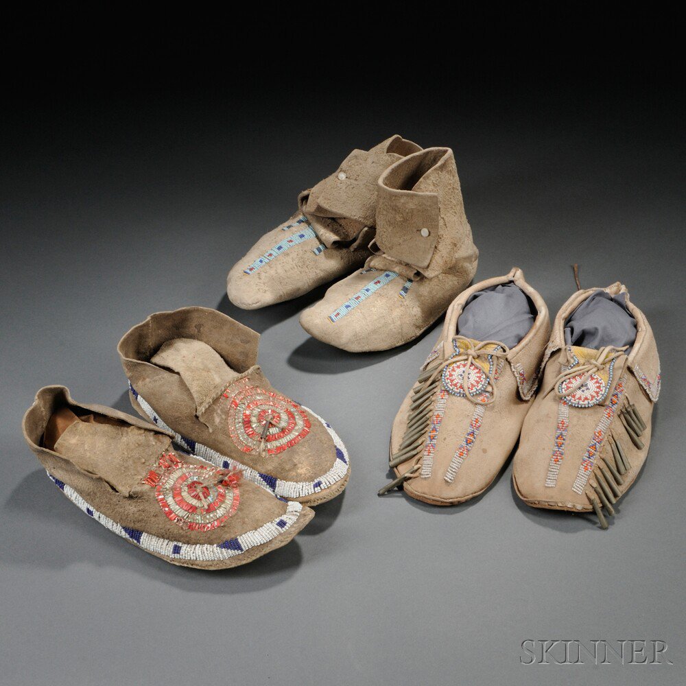 Appraisal: Three Pairs of Plains Moccasins pair of partially beaded Crow