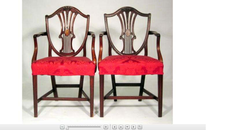 Appraisal: Pair of George III mahogany armchairs the shield form back