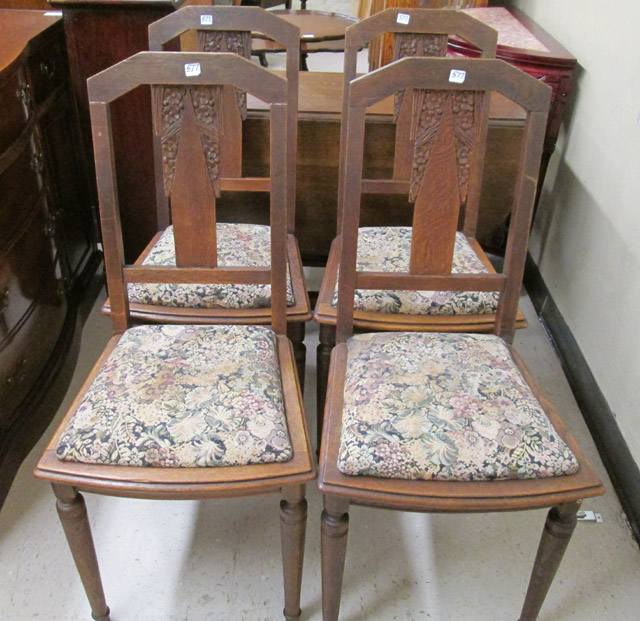 Appraisal: A SET OF FOUR CARVED OAK DINING CHAIRS Belgian early