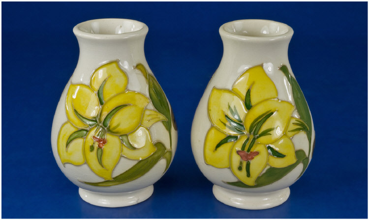 Appraisal: Moorcroft pair of small vases 's Bermuda Lily design on