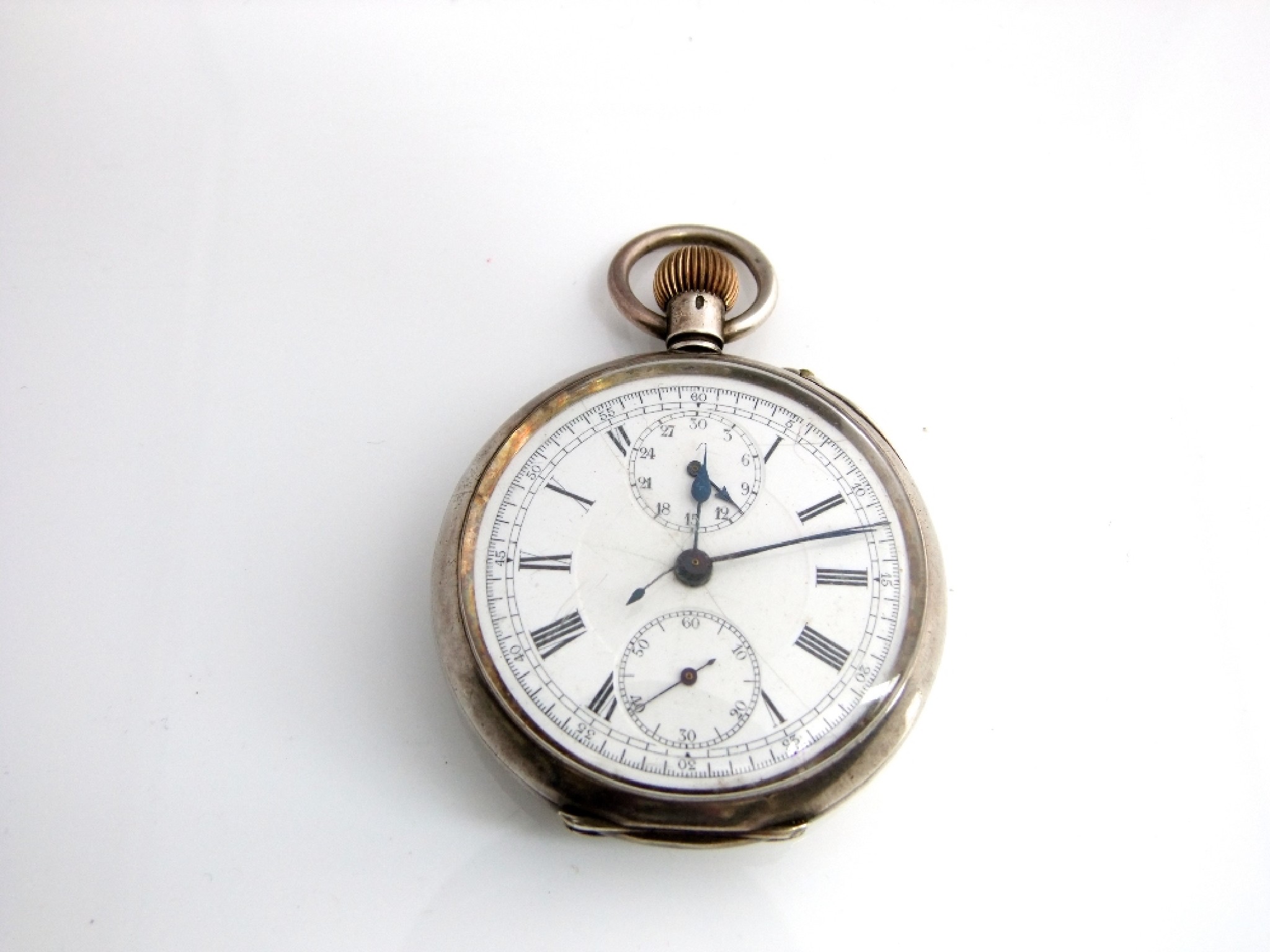 Appraisal: A silver cased chronograph pocket watch with white enamel dial