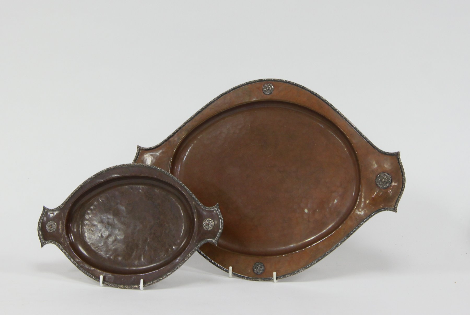 Appraisal: An oval copper tray by A E Jones cm wide