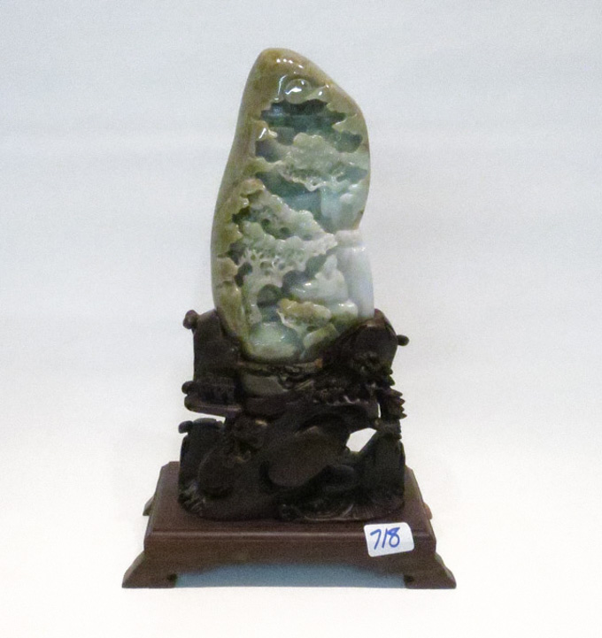 Appraisal: CHINESE CARVED JADEITE BOULDER with conforming wood base Height including