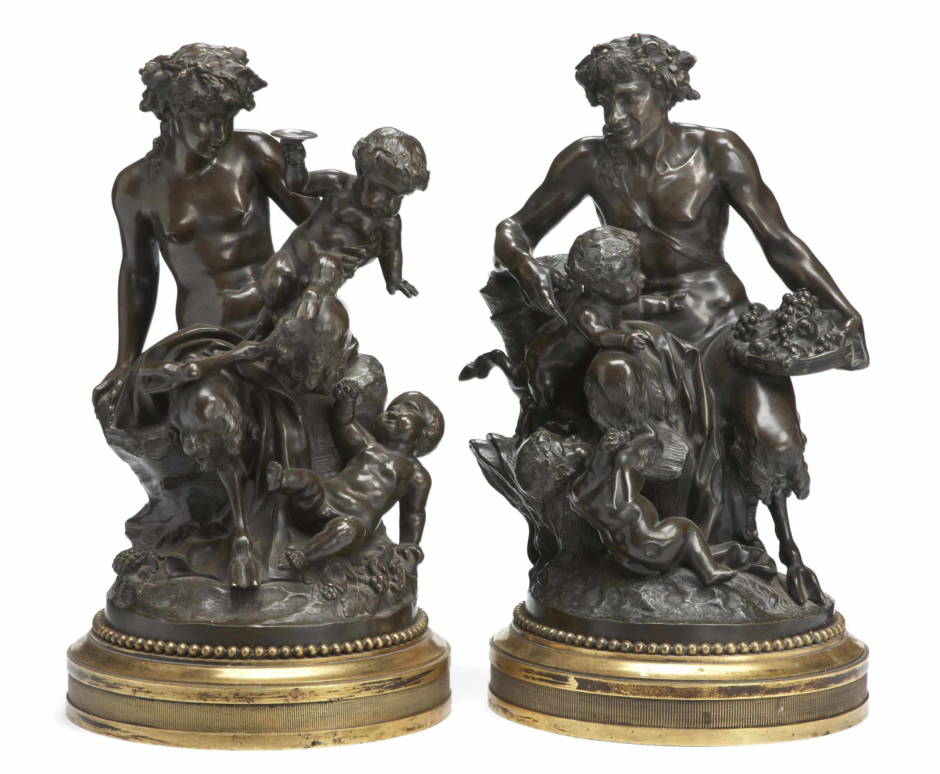 Appraisal: A pair of French patinated bronze figural groups after models