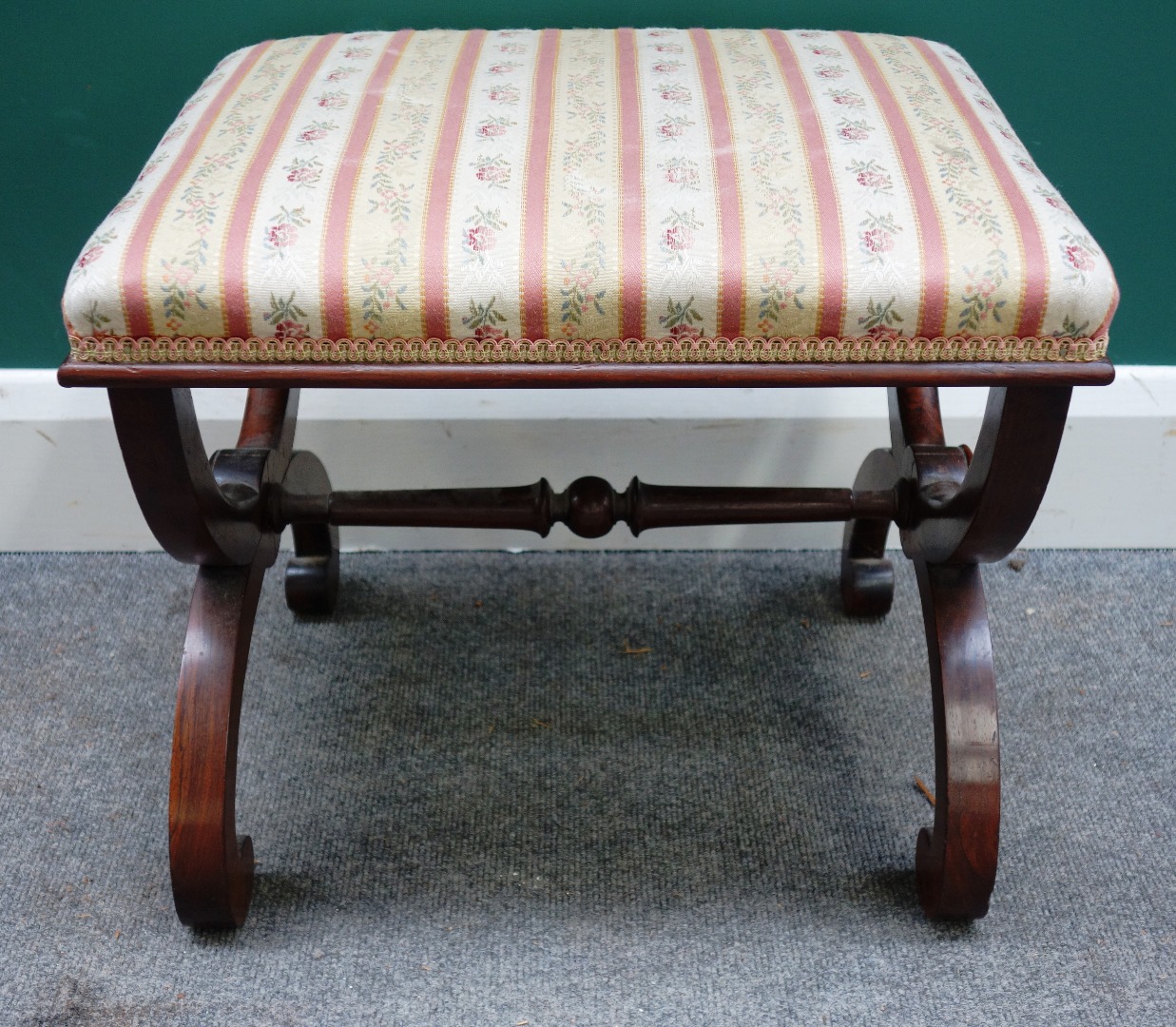 Appraisal: A th century rosewood framed footstool on 'X' frame supports