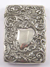 Appraisal: An embossed Edwardian silver card case with vacant cartouche Birmingham