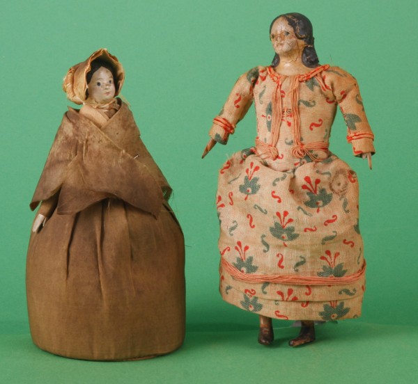 Appraisal: Pair of papier mache dolls - pin cushion in Shaker