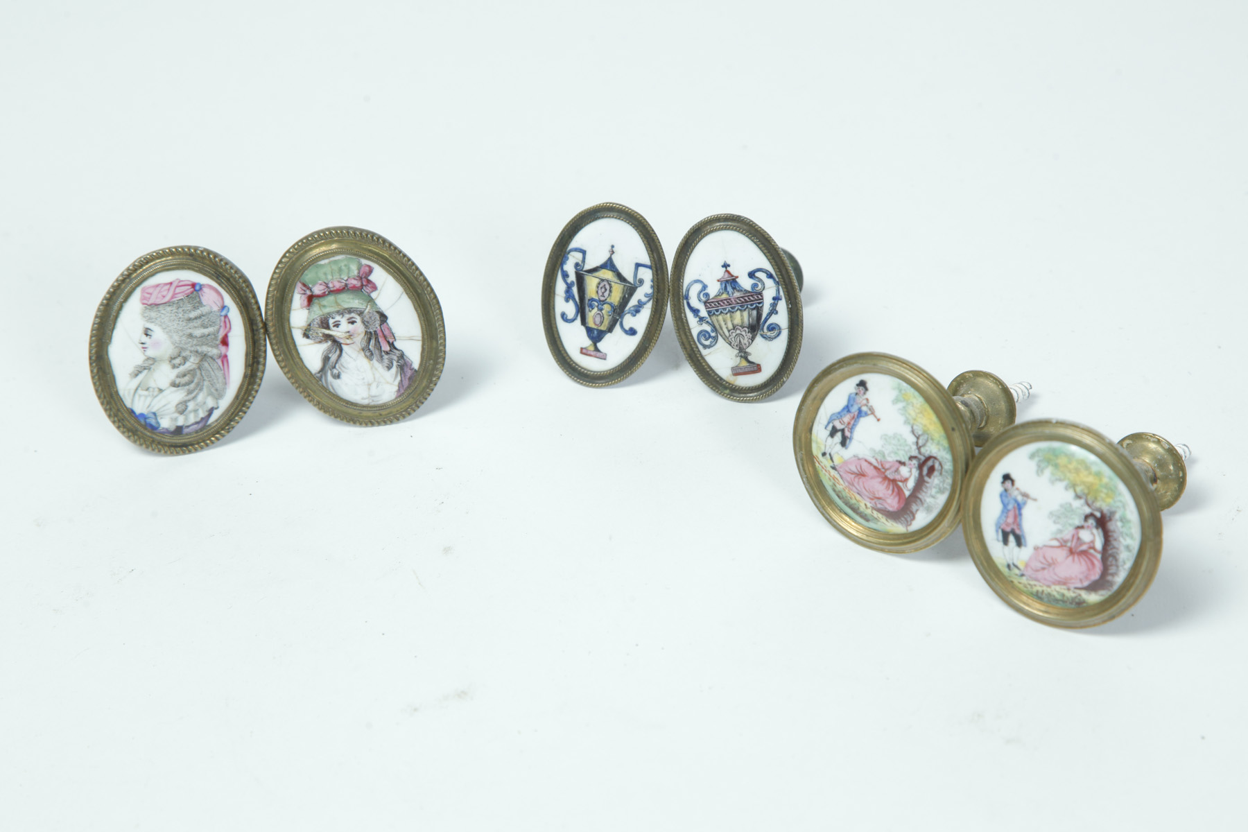 Appraisal: SIX BATTERSEA ENAMELED TIE BACKS England late th-early th century