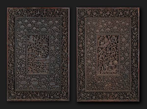 Appraisal: A pair of deeply undercut hongmu doors th th Century