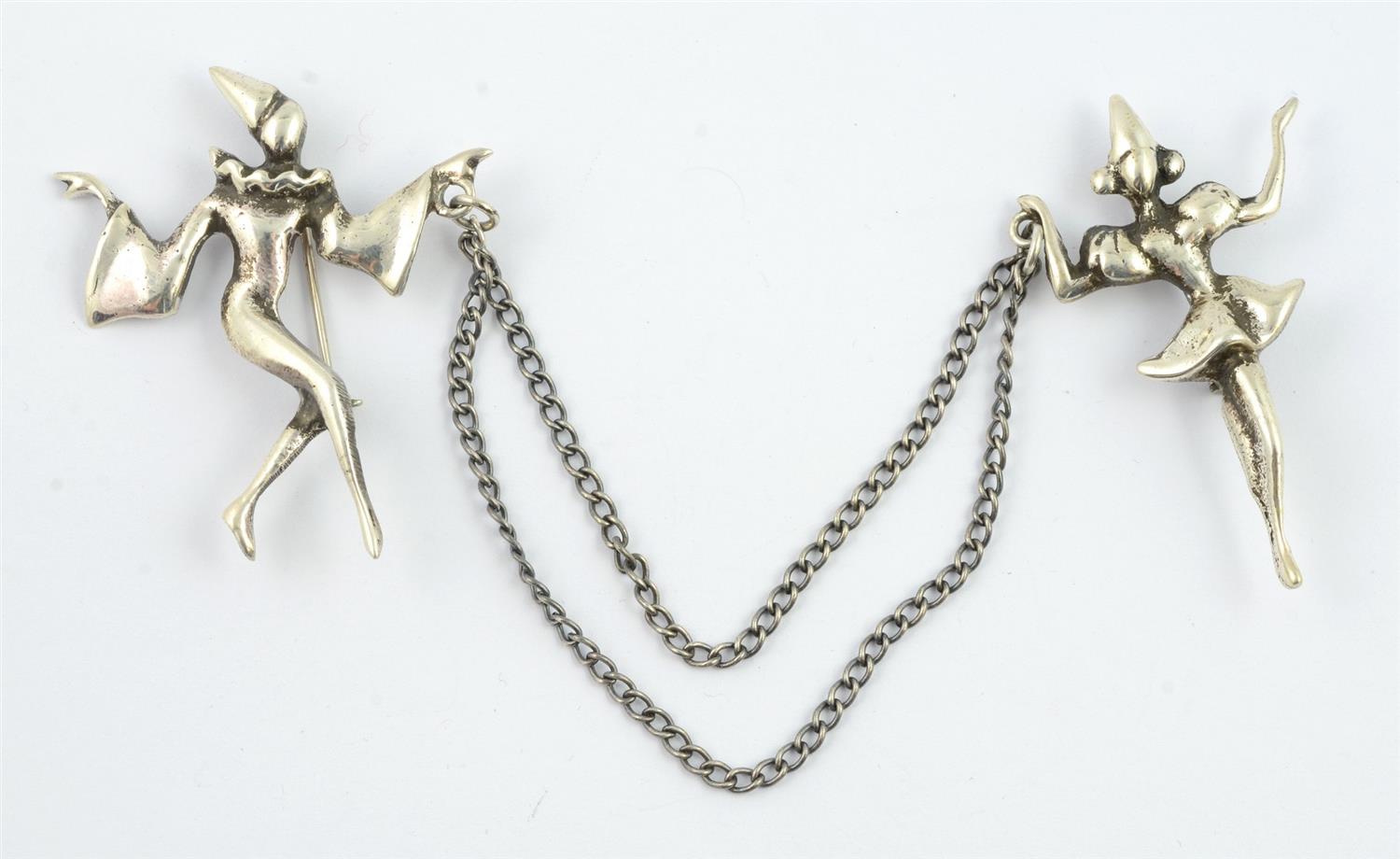 Appraisal: Sterling silver sweater pin harlequin design double chain each character