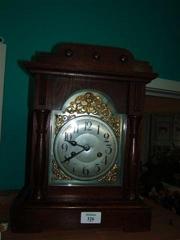 Appraisal: A late th early th Century oak mantel clock the