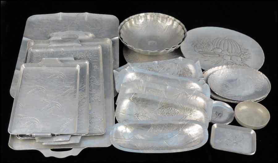 Appraisal: COLLECTION OF WENDELL FORGE HAMMERED ALUMINUM Comprised of trays platters