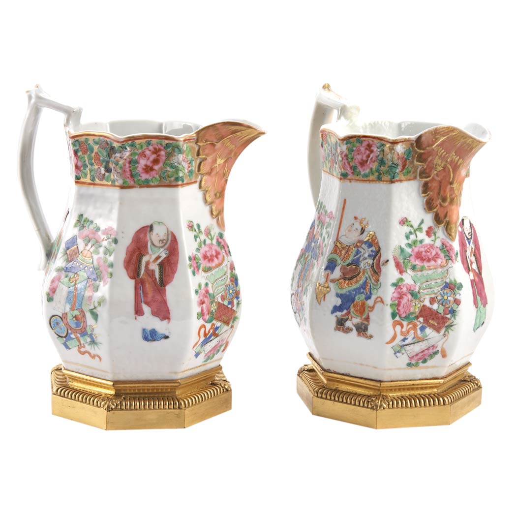 Appraisal: Pair of Chinese Export Gilt-Bronze Mounted Famille Rose Porcelain Jugs