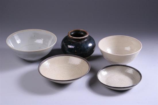 Appraisal: TWO CHINESE QINGBAI PORCELAIN BOWLS AND TWO JAPANESE SAUCERS Song