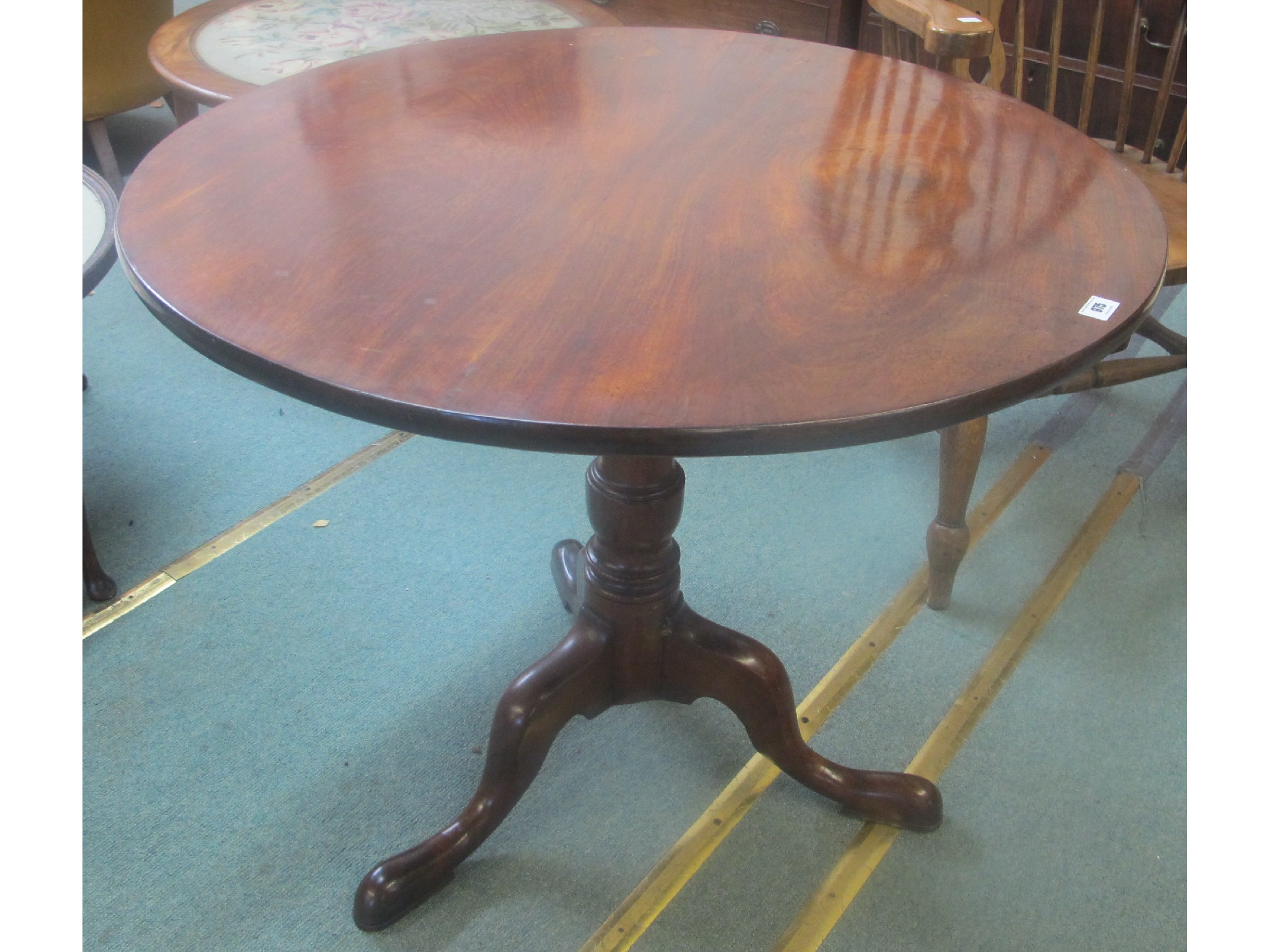 Appraisal: A th Century mahogany snap top table on a tripod