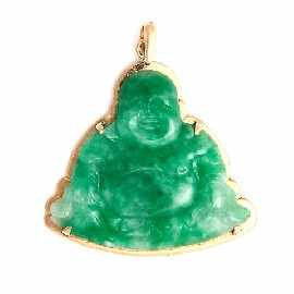 Appraisal: A ct gold mounted carved jade Buddha pendant approximately x