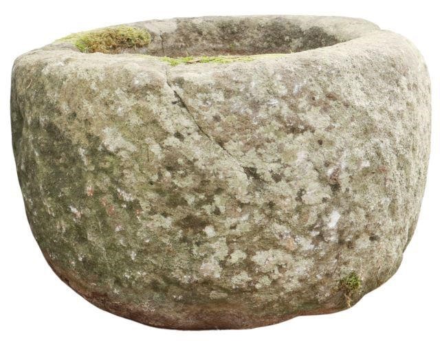 Appraisal: Rustic stone basin mortar th c irregular cylindrical form approx