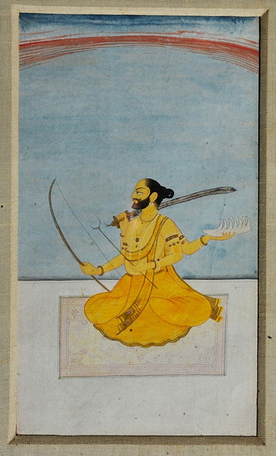 Appraisal: AN INDIAN MINIATURE PAINTED WITH FIGURE DRESSED IN YELLOW seated