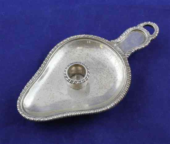 Appraisal: A Victorian silver chamberstick of horizontal pear shape with gadrooned