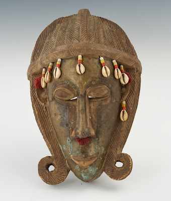 Appraisal: A Benin-Type African Mask Ivory Coast The carved wood form