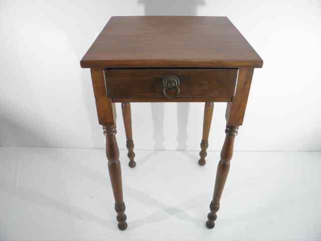 Appraisal: Maple finished one-drawer stand with spindle-style carved legs and single