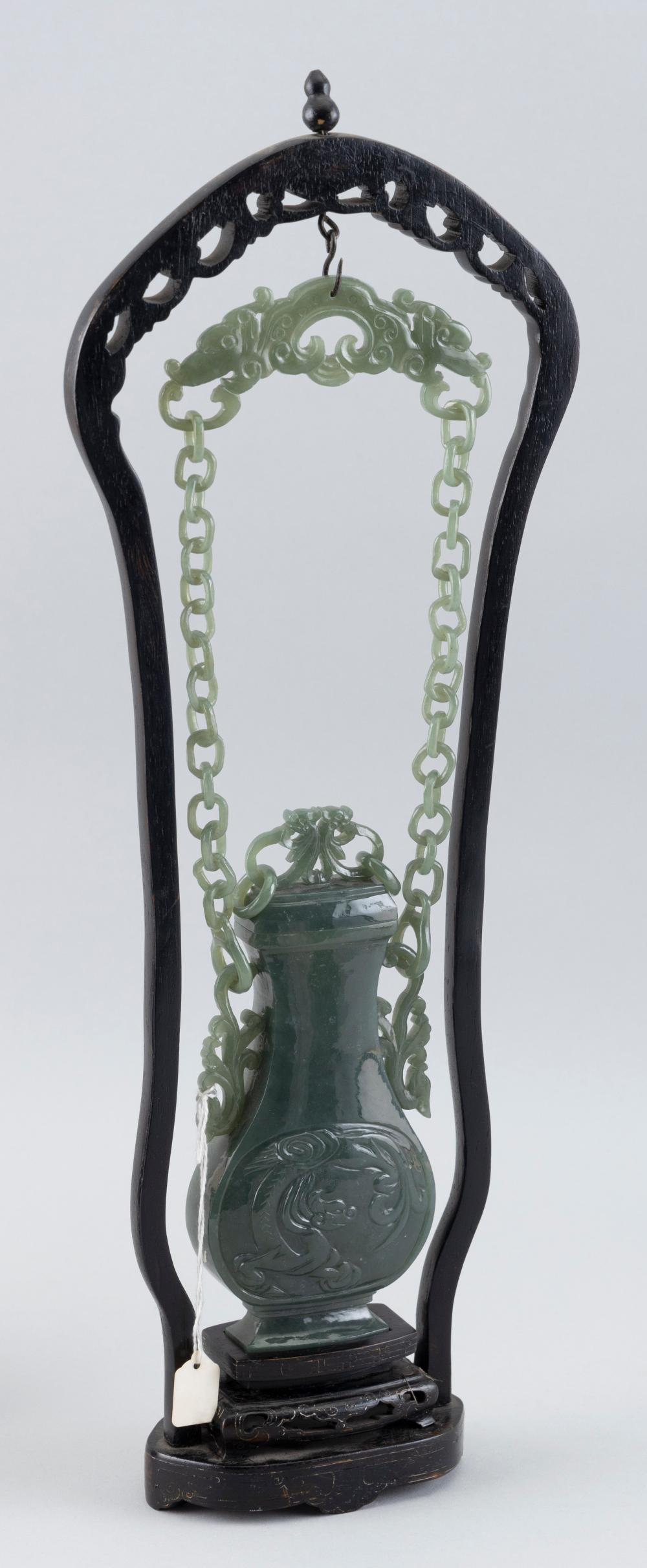 Appraisal: CHINESE GREEN JADE COVERED VASE WITH WOOD STAND VASE HEIGHT